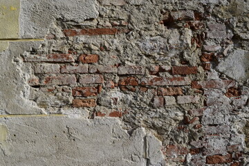 Old demolished brick wall texture 