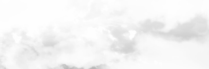 Sky with clouds, a view from an aeroplane above the clouds. Abstract nature background with clouds in light tonality. White cumulus clouds