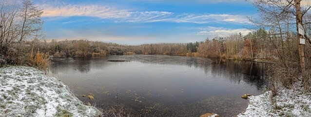 Fototapeta premium View of the ice surface of the draught frozen lake Oberwaldsee during the day