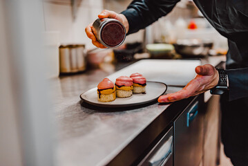 chef cooking Terrine of foie gras on kitchen