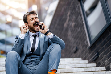 Man  enjoying music on the phone