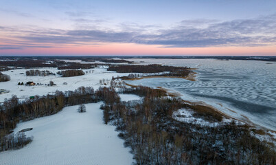 Fototapeta na wymiar Christmas Eve, sunset at Lake Siver. Latvia & Latgale.