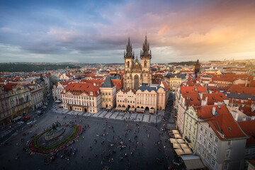 Naklejka na ściany i meble Aerial view of Old Town Square with Tyn Church at sunset - Prague, Czech Republic