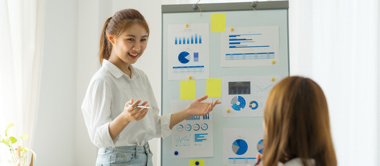 Friends of asia female employee worker discussing and accountant checking data document for investigation of corruption account. Anti Bribery concept, great business conversations © Phushutter