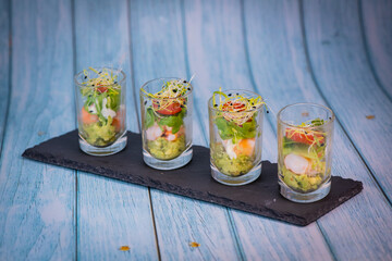 Avocado shrimp arugula mayonaise, espelette pepper and lemon, leek sprouts recipe, High quality photo