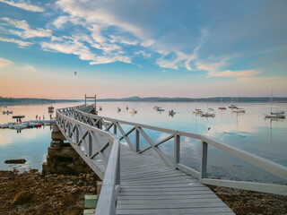 Sky Reflection on Water with Boats