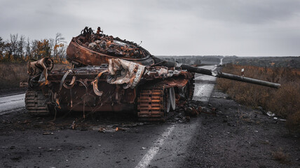 The war in Ukraine, the road to the city of Izyum, the destroyed Russian tank, the rear view,...