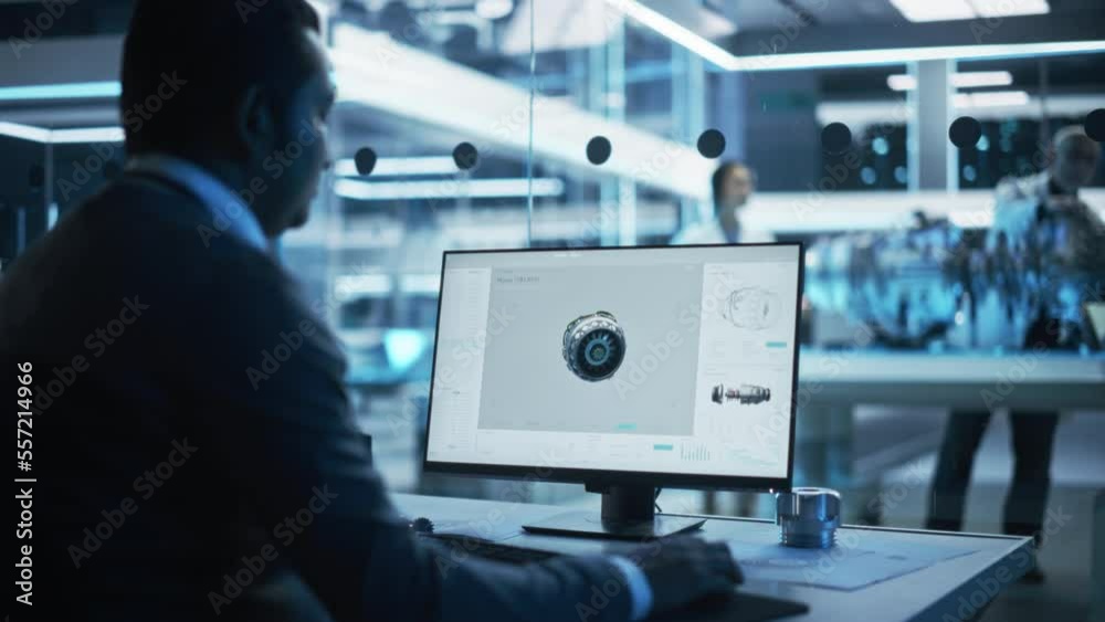 Poster Industrial Engineer Working on CAD Software on Desktop Computer in Turbine Engine Startup Facility. Specialists and Professionals Researching and Developing High Tech Engine Technology.