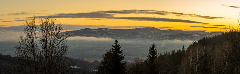 Winter sunset panorama of Beskid Mountains in Czech Republic nearby Filipka mountain peak