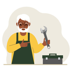 A old man holds an adjustable wrench in his hand and a tool box next to it. The concept of technical repair or service.