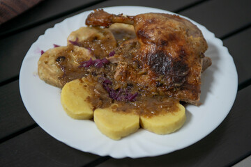 duck meat and dumplings  in a plate. Czech cuisine dish .Knödel