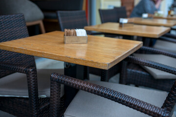 tables and chairs in an outdoor restaurant