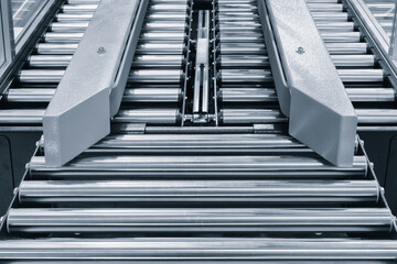 Obraz premium Conveyor Belt Food.Factory for the production of food. Production line with packaging. Food products in plastic packaging on the conveyor. food production concept