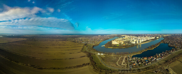 rice paddies after harvest near the Kuban river and the cities of Krasnoadr - aerial view panoramic view on a winter day - obrazy, fototapety, plakaty