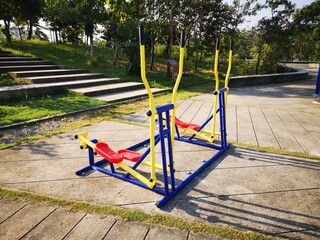 Outdoor sports, outdoors gym equipment at the park sports ground. exercise machines for training, activity at workout space.
