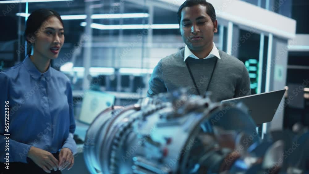 Aufkleber Young Team of Engineers, Project Manager and Machinery Operators Collaborate on a New Type of a Gas Jet Turbine Engine, Standing with a Laptop Computer in Scientific Technology Lab.