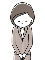 おじぎするスーツの女性