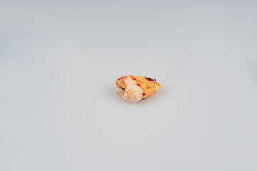 Human wisdom tooth isolated on gray background. Dentistry concept. Macro photo of a wisdom tooth...