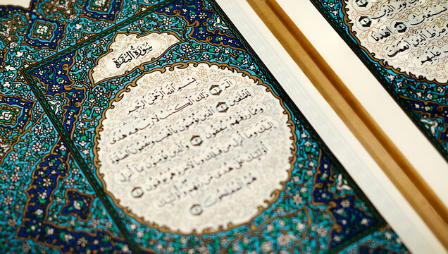 A close-up shot of Surah Al-Baqarah in the first pages of the Holy Quran, Quran holy books of Muslims, Allah, and God, Muslim, Surah Quran.