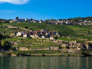 View from Lake Geneva in Switzerland at the village of the Lavaux vineyard terraces - Unesco Heritage