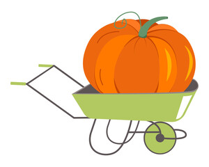 big pumpkin on a wheelbarrow