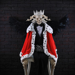 skeleton king in royal chair