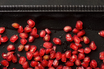 Pomegranate seeds in a tray