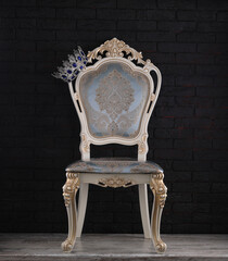 vintage royal chair on black background
