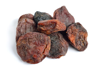 Whole Sun-dried apricots with stones. Isolated on white background