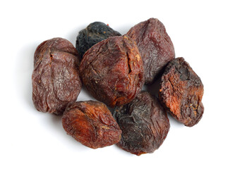 Whole Sun-dried apricots with stones. Isolated on white background