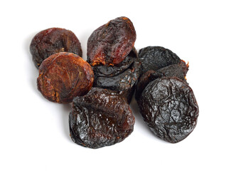 Whole Sun-dried apricots without stones. Isolated on white background