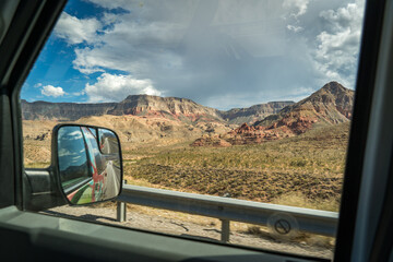 mountains seen from window car on the road