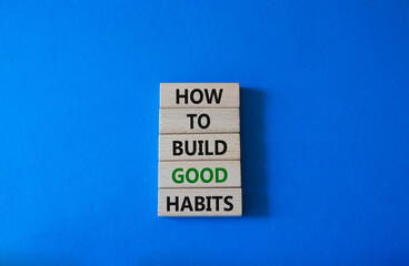How to build good credit symbol. Concept words How to build good credit on wooden blocks. Beautiful blue background. Business and How to build good credit concept. Copy space.