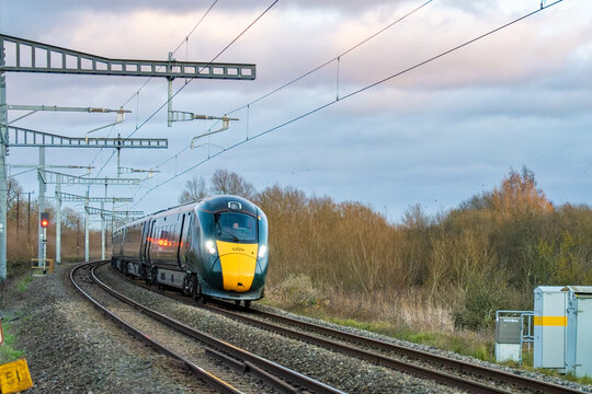 A fast intercity electric GWR train travelling to London Paddington - December 2022