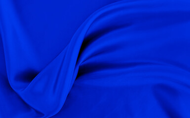 Black blue satin dark fabric texture luxurious shiny that is abstract silk cloth background with patterns soft waves blur beautiful.