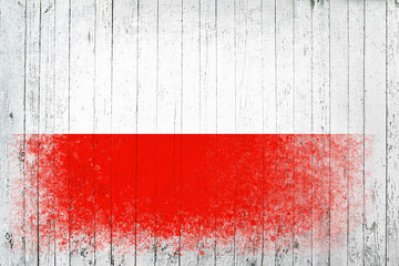 Flag of Poland. Flag is painted on a white wooden surface. Wooden background. Plywood surface. Copy space. Textured background