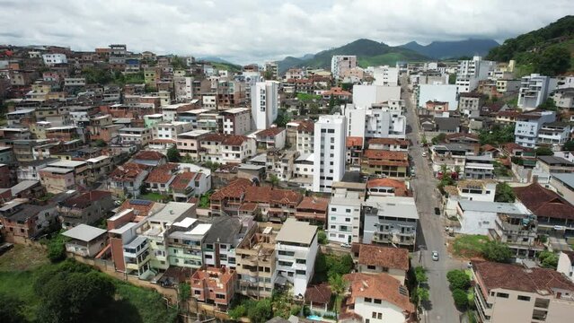 Aerial drone view of hilly countryside surrounding Manhuacu in Minas Gerais, Brazil