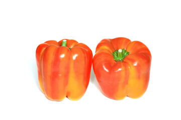 Top view of two striped Holland bell peppers.