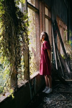 girl at Taman Festival Padang Galak in Bali, Indonesia, Abandoned building
