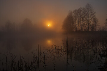 Obraz premium morning mist over the river