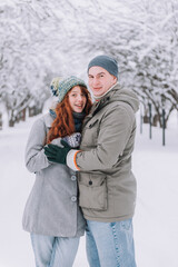 happy couple in love posing in cold winter weather.