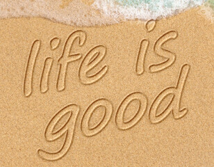 Life is good on a beach text positive thinking concept