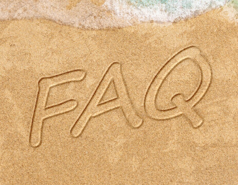 Frequently ask question concept, word faq written on beach
