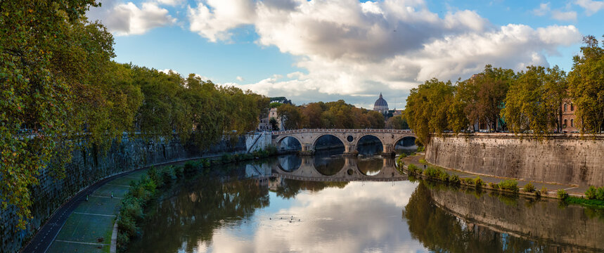 River Tiber and Bridge in a historic City, Rome, Italy. Sunny and Cloudy day. © edb3_16