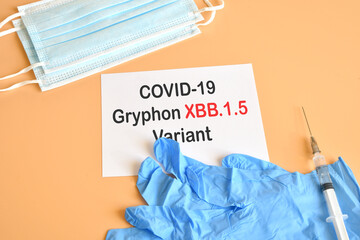 Gryphon XBB Variant. Syrynge, medical face masks, blue medical gloves with white paper with text...