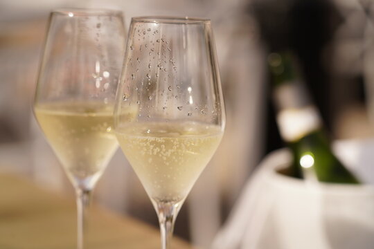 Two glasses of cava in a restaurant on the street