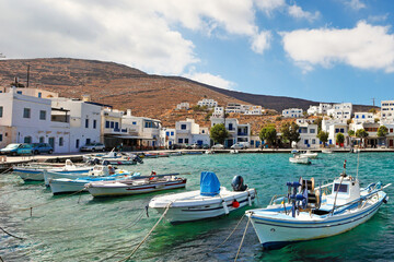 Fototapeta na wymiar The small harbor in the fishing village Panormos in Tinos, Greece