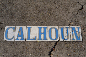 Traditional Calhoun Street Tile Inlay on Sidewalk in Uptown Neighborhood in New Orleans, Louisiana,...