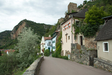 Fototapeta na wymiar Durnstein Historic Town Main Street With A Castle Ruins