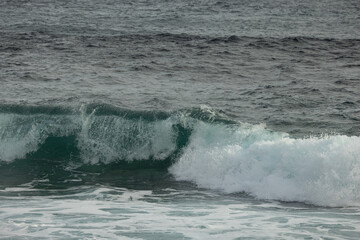 A big wave that's about to collapse. A huge power what this water has.